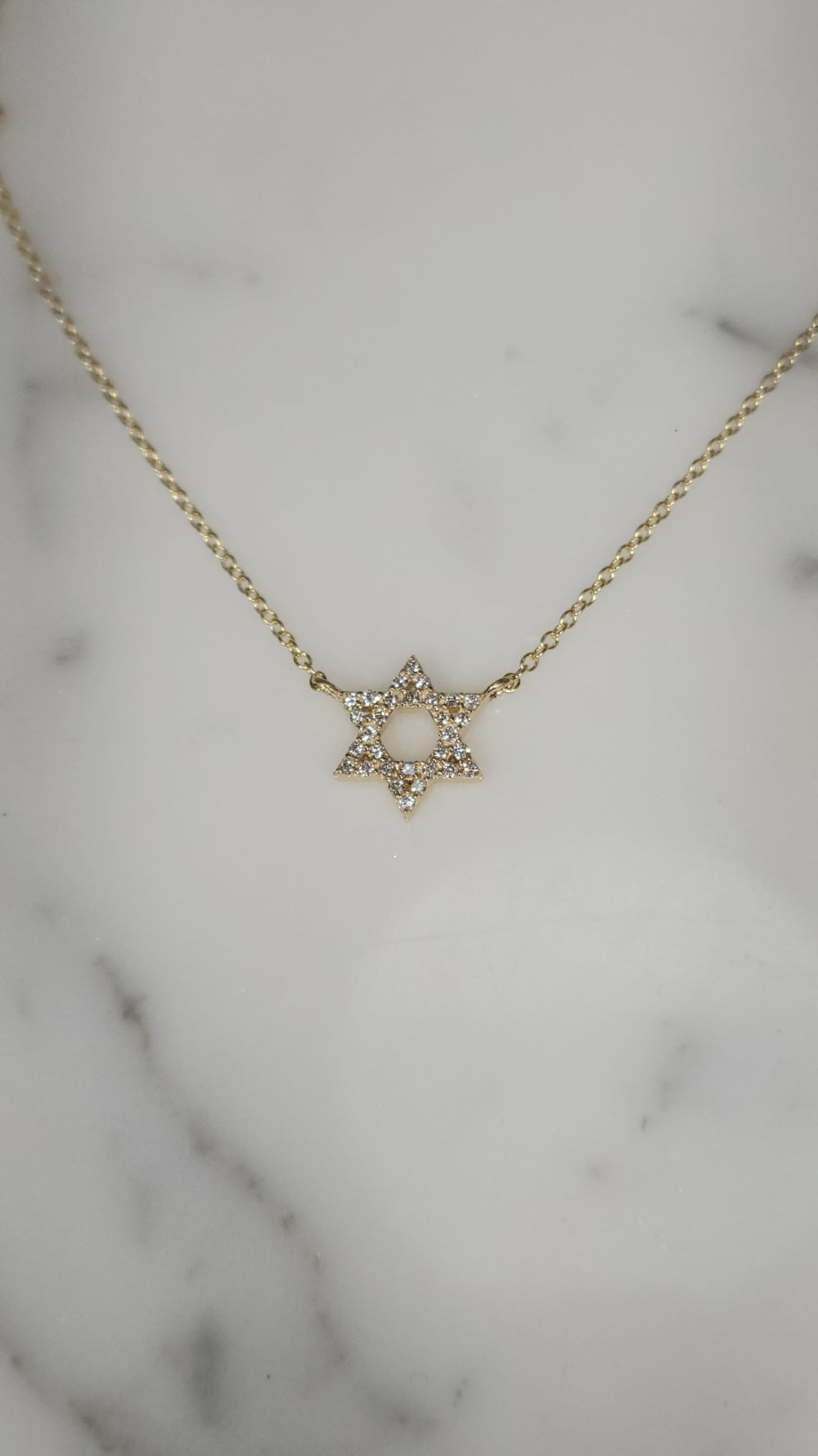 14KT gold and diamonds Star of David