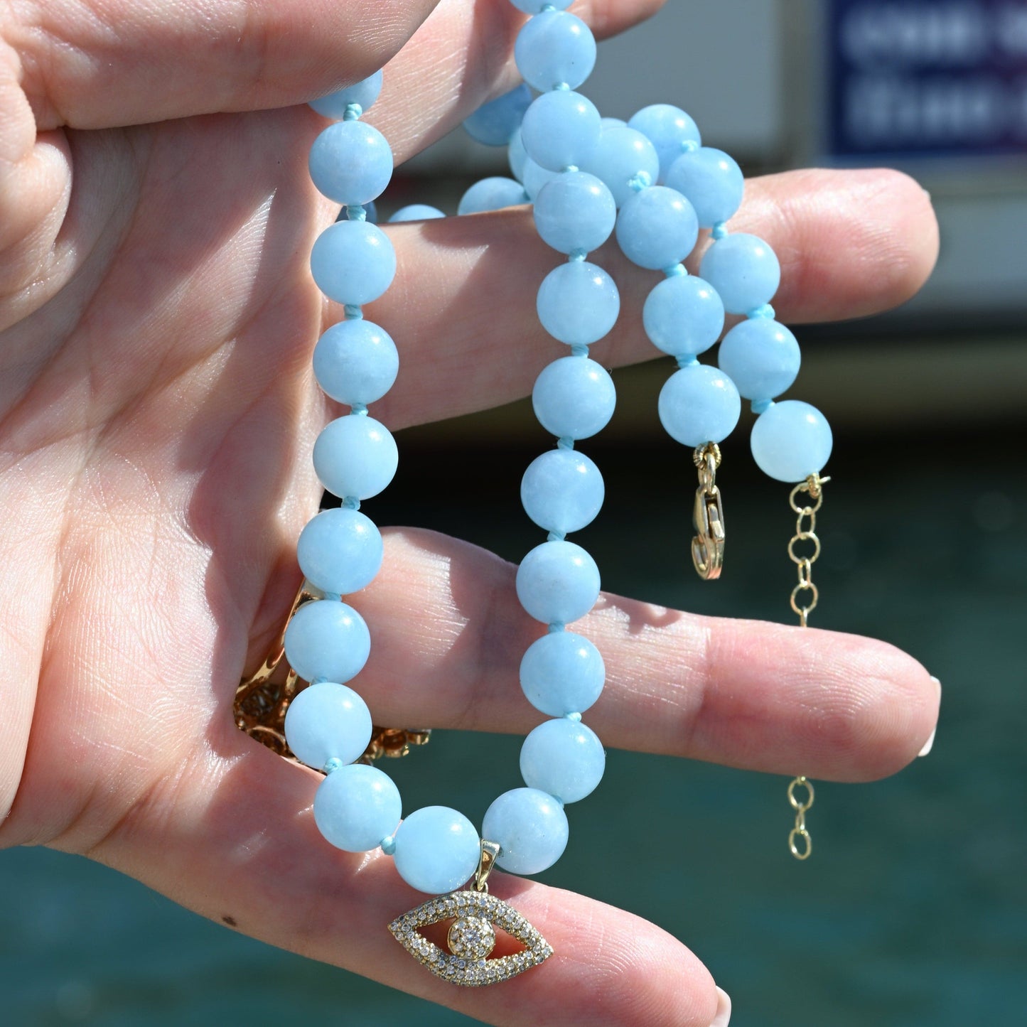 Dalia T Online 14KT diamonds Evil Eye on an Aqua beads Necklace
