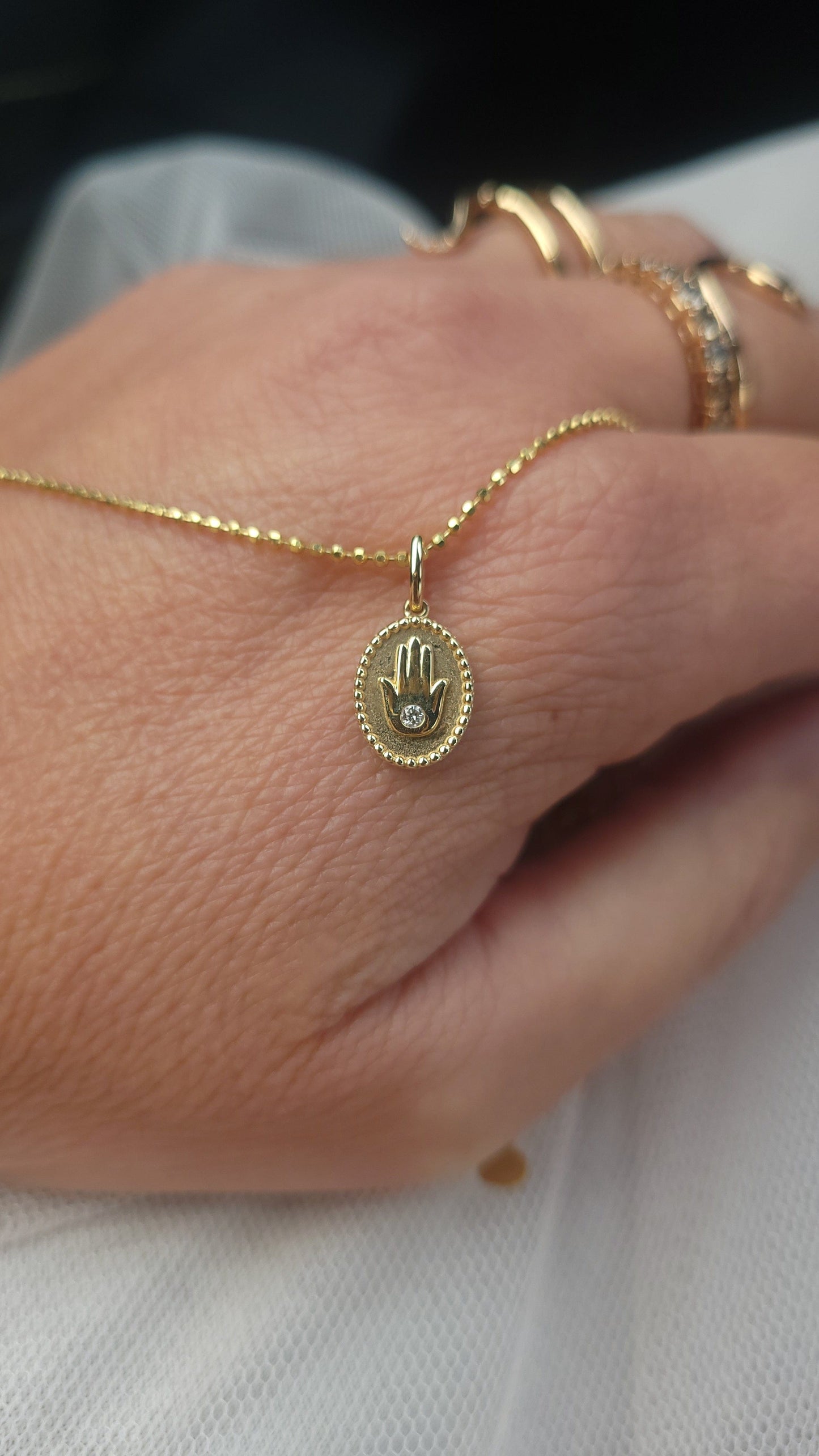 Dalia T Online Necklace 14KT Small Hamsa medallion necklace with a diamond