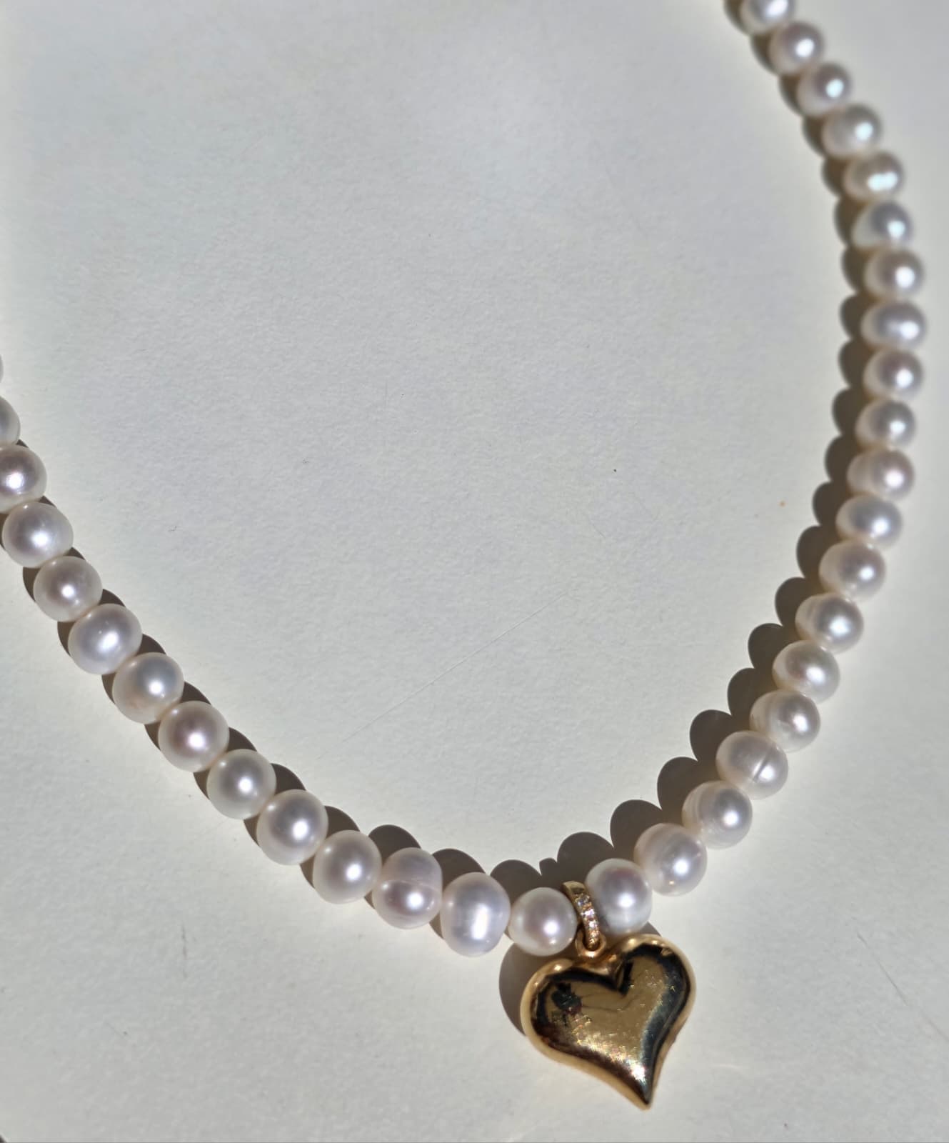 Dalia T Online Necklace Fresh water pearl necklace with a gold & dia puffed heart